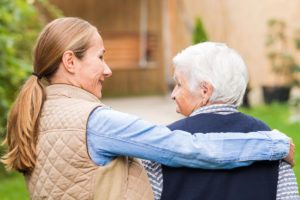 woman talking to senior about services provided in independent living