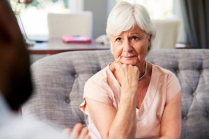 a senior talks about the difference between Dementia vs forgetfulness with a doctor