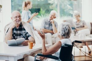 Group of happy elderly people in assisted living in Austin TX